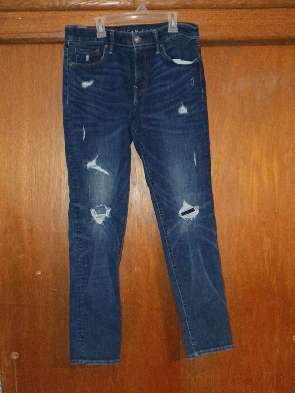 American Eagle Dark Blue Denim Jeans with Brown Patch